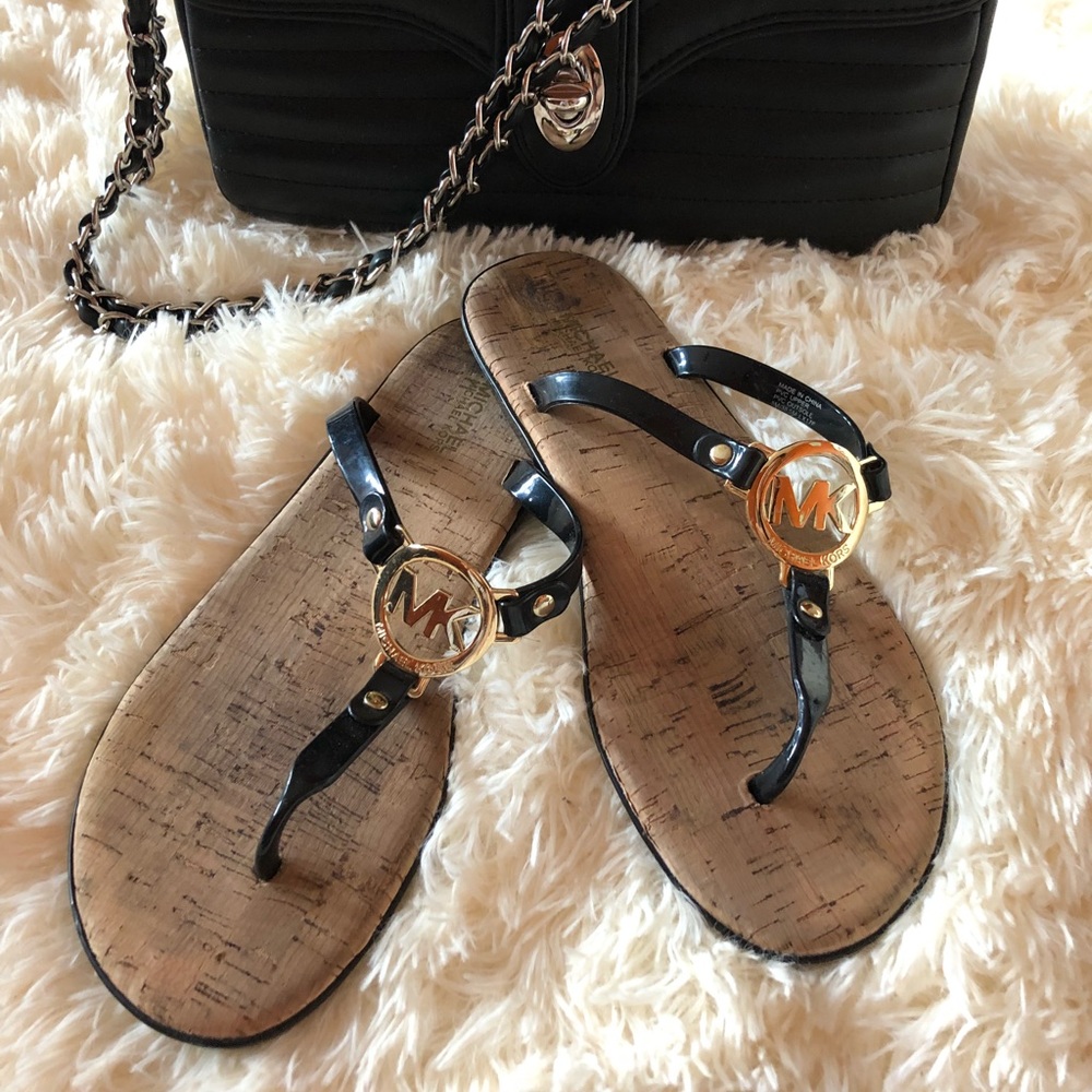 Two pairs of Michael kors flat sandals